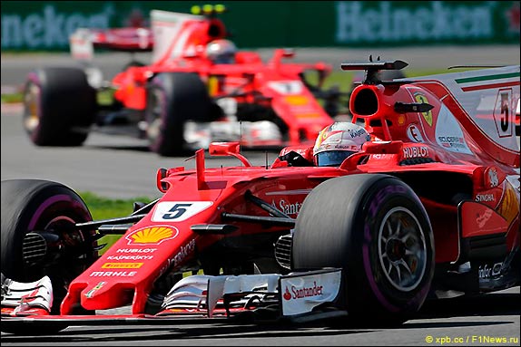 Себастьян Феттель и Кими Райкконен Себастьян Феттель и Кими Райкконен