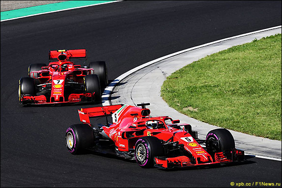 Себастьян Феттель и Кими Райкконен Себастьян Феттель и Кими Райкконен