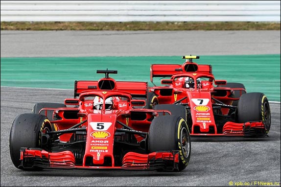 Себастьян Феттель и Кими Райкконен Себастьян Феттель и Кими Райкконен