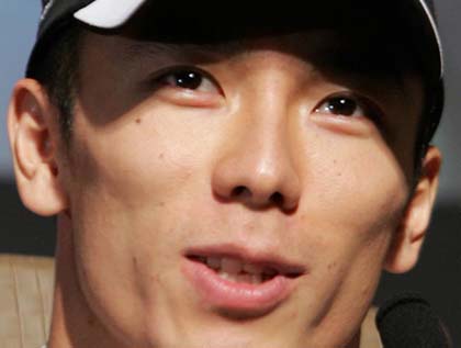 Такума Сато