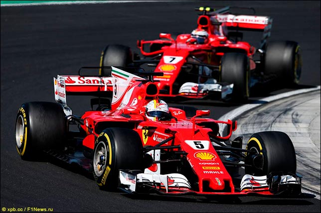 Себастьян Феттель у Кими Райкконен