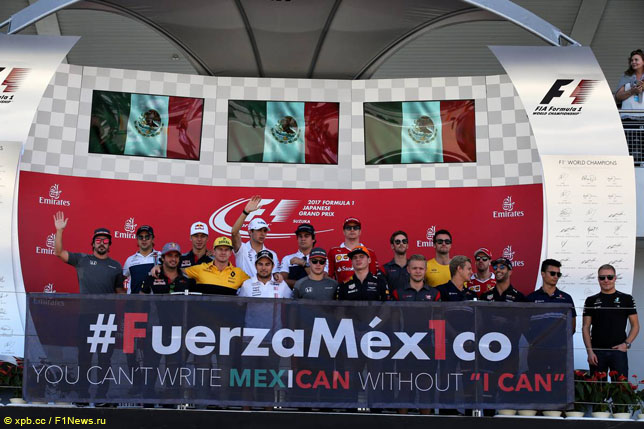 Гонщики на подиуме в Сузуке