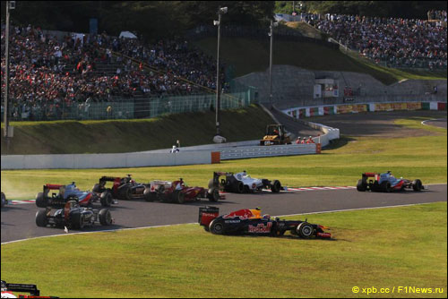 Столкновение Романа Грожана и Марка Уэббера во втором повороте Гран При Японии