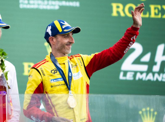 Роберт Кубица на подиуме в Ле-Мане, фото XPB