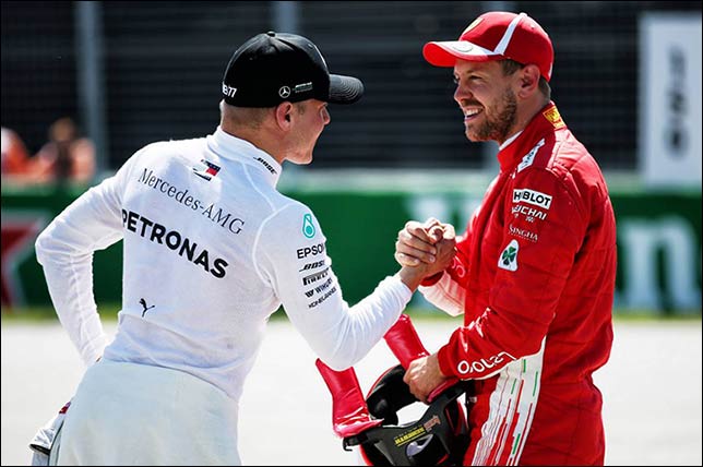 Валттери Боттас поздравляет Себастьяна Феттеля с победой в квалификации