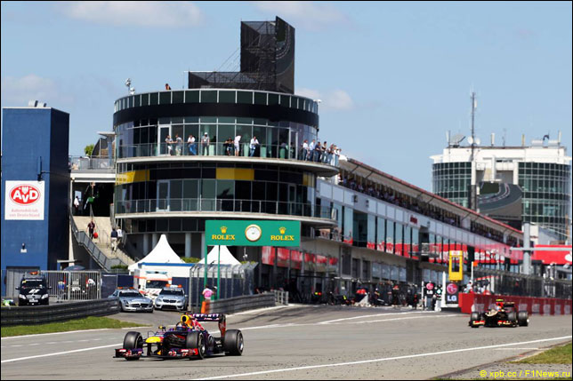 Себастьян Феттель и Роман Грожан на Гран При Германии 2013 года