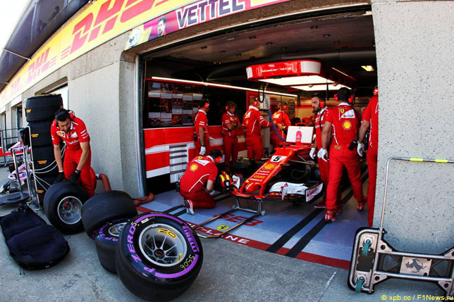 Шины Pirelli около боксов Себастьяна Феттеля