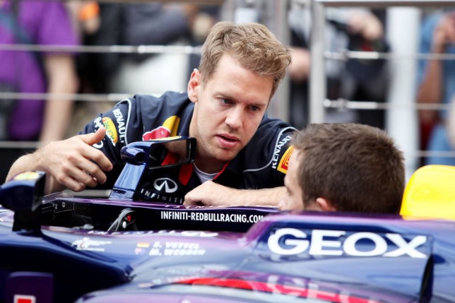 Себастьен Ожье в кокпите машины Себастьяна Феттеля, Гран При Монако, 2013 год, фото XPB