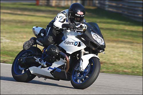 Алекс Дзанарди за рулём мотоцикла